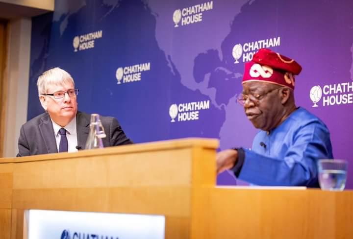 Tinubu speaks at Chatham House as Alex Vines looks on