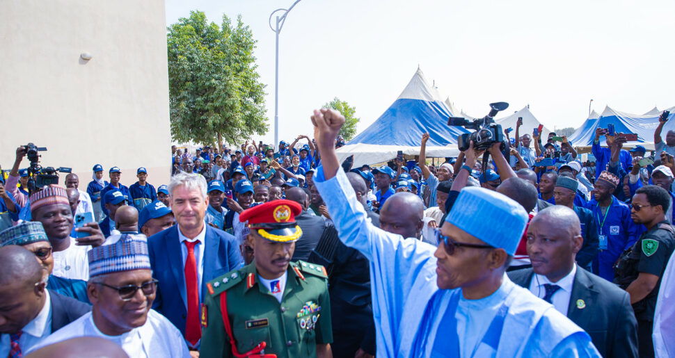 Buhari acknowledges cheers in Kano