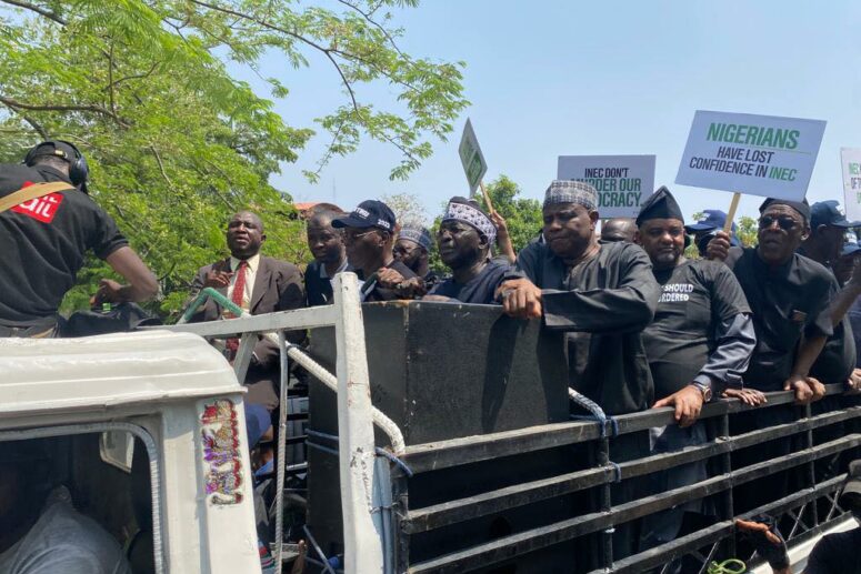 Atiku in face cap, with other party officials