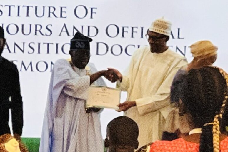 Tinubu receives from President Buhari the certificate of GCFR