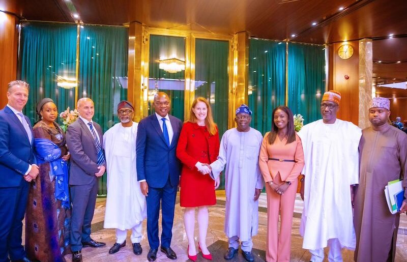 Ms Zoe Yunovic, (in red ) the Global Upstream Director, SPDC and others with President Tinubu, Olu Verheijen, Mele Kyari and Zach Adedeji